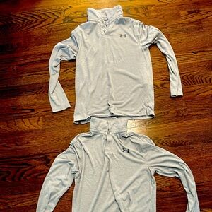 Under armor, gray half zip pull over, medium and large excellent condition
